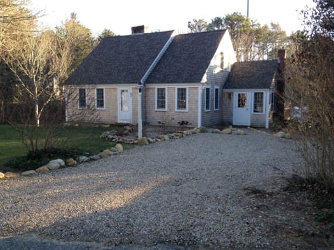 Front of House with mudroom on right and parking for 3 vehicles