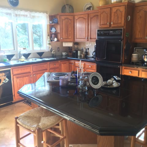 Kitchen with travertine floors .. light and airy..