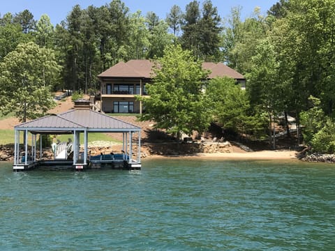View from the lake. Private beach and fire pit. Great swimming and playing area!