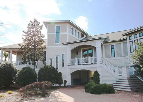 Front of home with portico and elevator