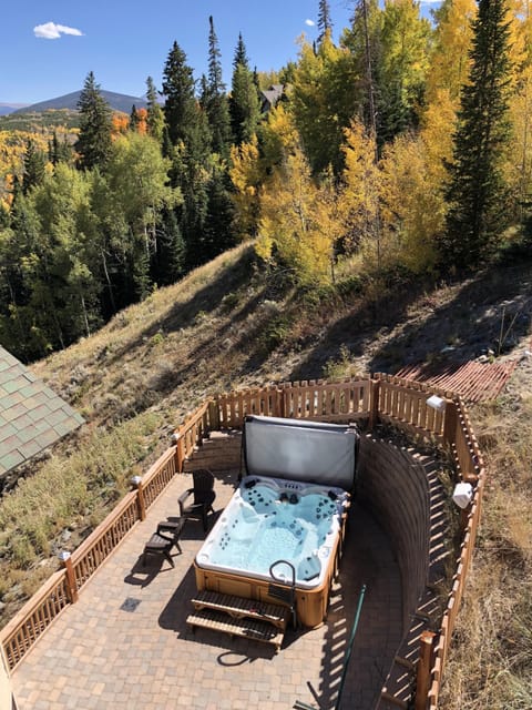 Patio and big tub taken from wood bridge/parking structure.
