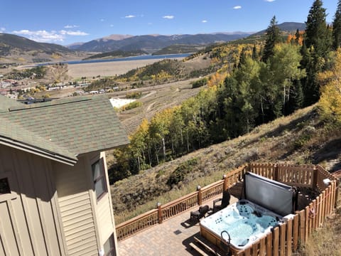 Photo taken from wood parking structure of patio & hot tub.