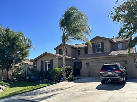 The cozy studio is completely detached and facing the street.