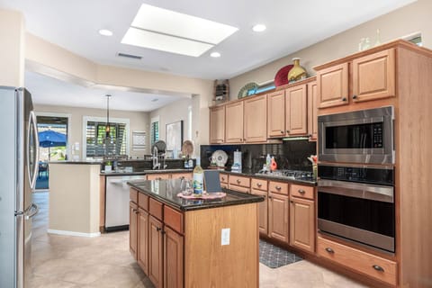 Beautifully appointed kitchen with SS appliances, fully stocked, w/great flow!