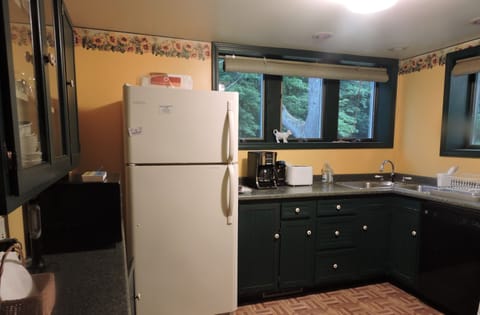 Roomy kitchen is fully stocked