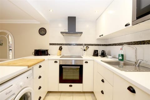 Modern kitchen is fully fitted with quality appliances