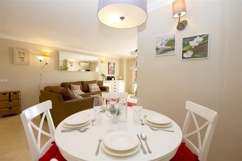 Dining area for four guests next to the kitchen