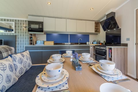 The open-plan dining/kitchen area is sociable and easy to work in