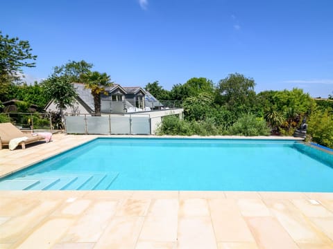 Pool with Summer House in background 