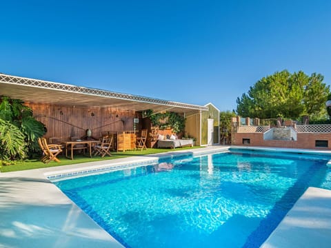 Water, Sky, Plant, Swimming Pool, Azure, Shade, Tree, Building, Body Of Water, Grass