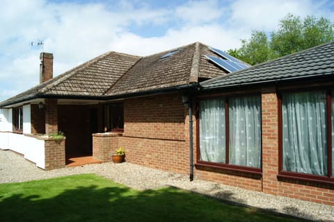 Front entrance via covered porch area