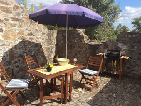 Small yard, with barbecue.