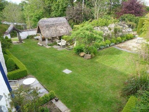 The patio and garden in front of the  Cottage