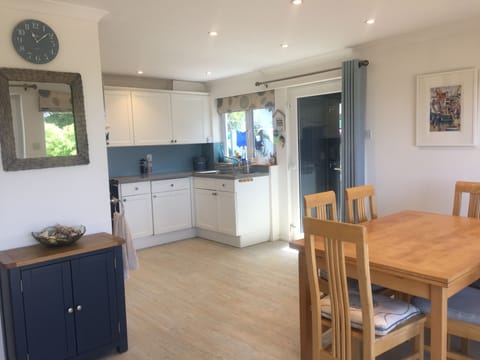 kitchen with extendable dining table for up to 8