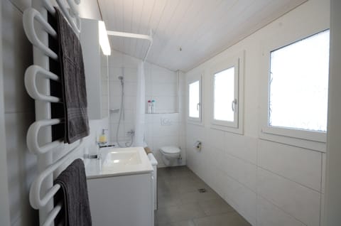 New family bathroom.  Large and light. with hairdryer.