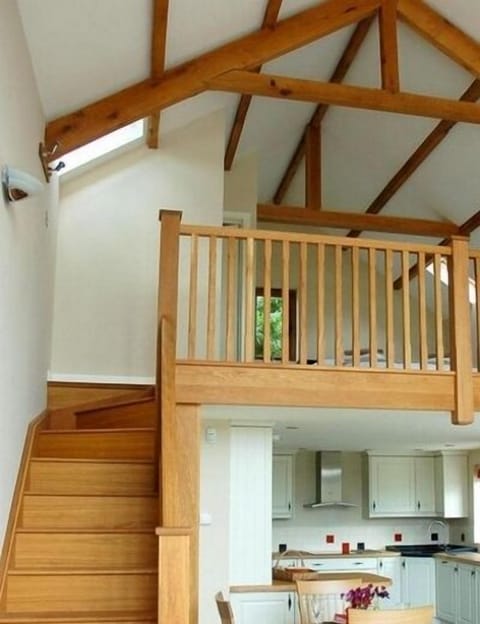 Oak Staircase leading to Bedroom and En-suite shower room.