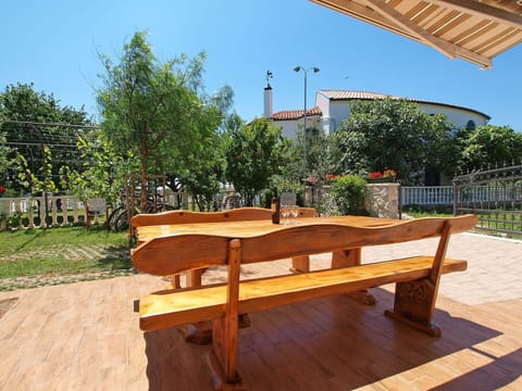 Table, Furniture, Property, Hardwood, Outdoor Table, Outdoor Furniture, Wood Stain, Room, Wood, House