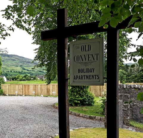 Sign and car parking, each apartment has it's own numbered parking space.