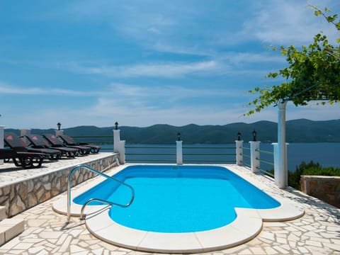 Water, Sky, Cloud, Property, Swimming Pool, Nature, Azure, Rectangle, Outdoor Furniture, Plant