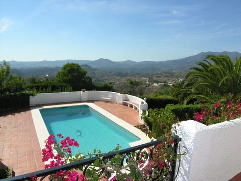 The private pool with views across the Mijas hills