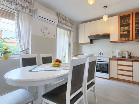 Property, Room, Furniture, Building, Kitchen, Interior Design, House, Yellow, Real Estate, Cabinetry