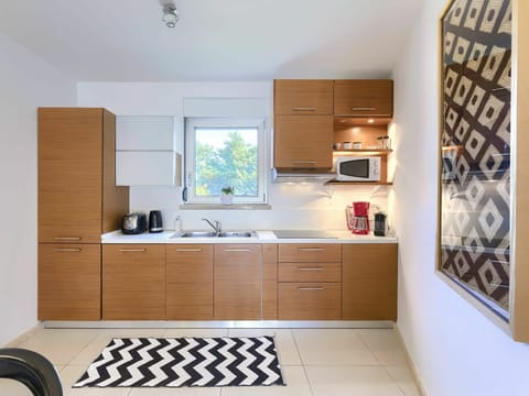 Cabinetry, Furniture, Property, Countertop, Kitchen Sink, Wood, Kitchen, Interior Design, Home Appliance, Architecture