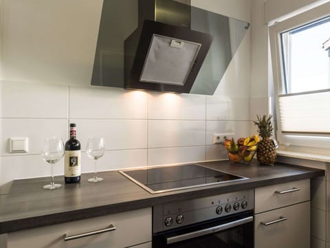 Kitchen with oven and microwave