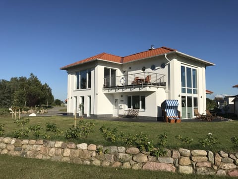 The captain mansion with the beach chair for romantic evening hours..