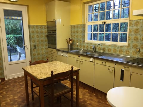 The large Provencal kitchen overlooking the terrace