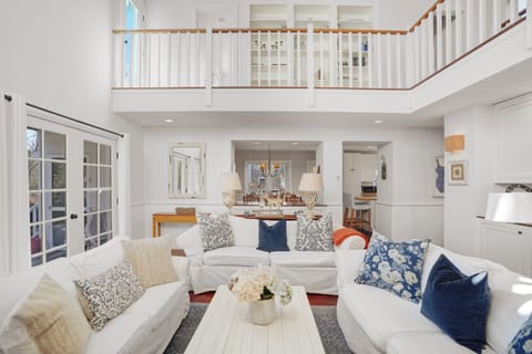Living room has lots of light. The French doors lead out onto a wonderful porch