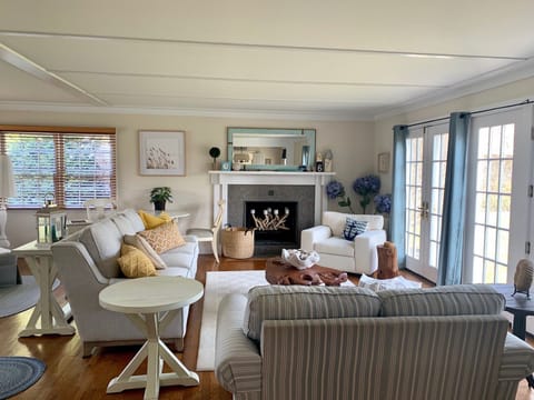 Large and bright living room, with working fireplace. 
