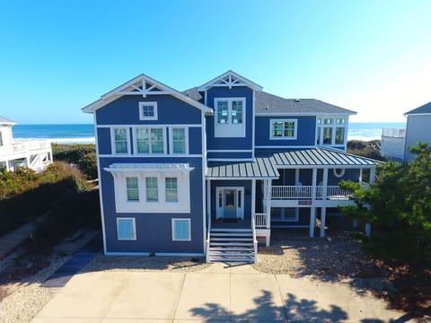 House front, driveway parking for 11