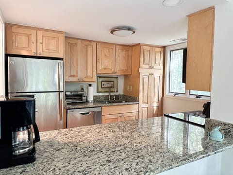 Full size appliances, serving and prep area