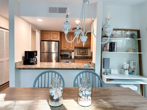 Dining area with study nook, tea station. Serve food directly from kitchen