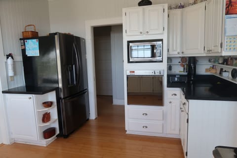 Convection oven & microwave & cafe style refrigerator.