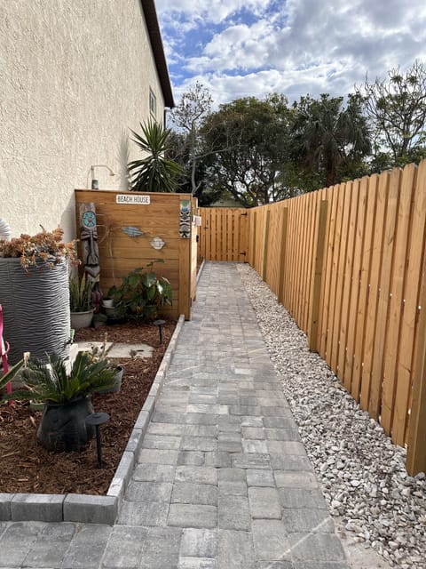 Walkway to your private backyard and suite
