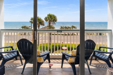 Sunrise coffee on your private beachfront balcony in Galveston.