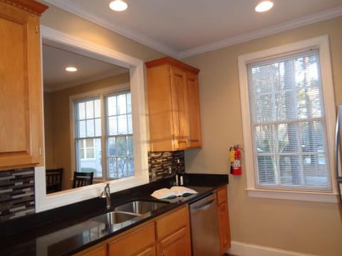 New silestone with tile  back splash and dishwasher
