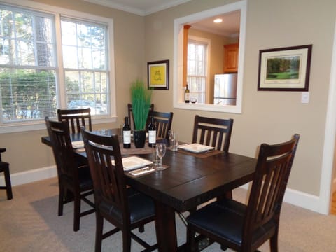 New dining room table; seats eight (8) with new  serving platters.