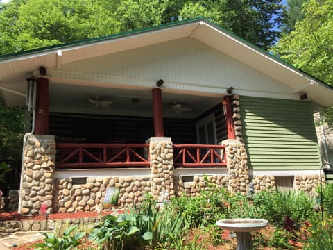 Cokesbury Cabin front porch with rocking chairs & table for dining on the porch