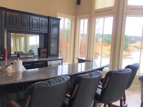 gastropub bar in the greatroom is a great way to host or hang out day or night