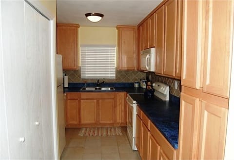 Fully stocked kitchen and full size washer and dryer.