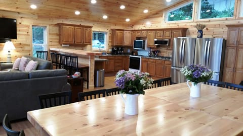 Kitchen has 2 fridges, 2 gas cooktops, double oven, 2 dishwashers, microwave.