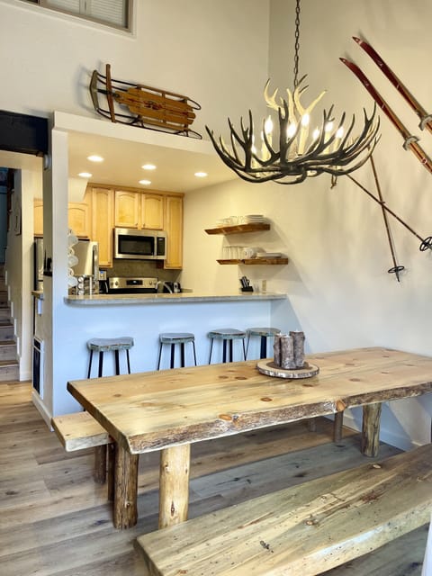 Our custom made log table and bench seating comfortably seats 10!