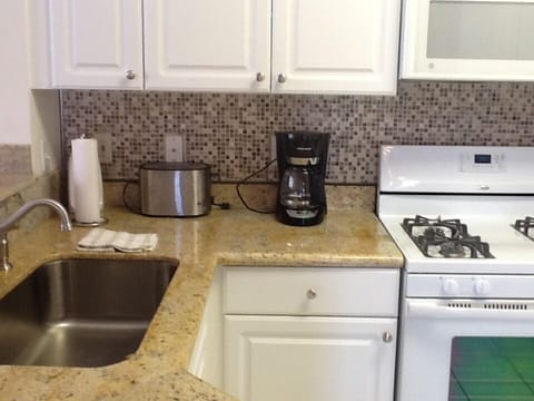 Everything you need to cook, bake, microwave and with a dishwasher also.