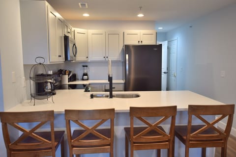 New kitchen with quartz counter tops and new appliances