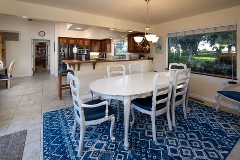 The dining room table will seat up to 8 and the breakfast nook seats 4 and there is an add`l table in the living room. Plenty of seating for all.