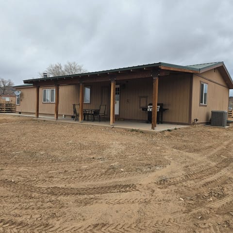 covered porch for visiting and grilling steaks