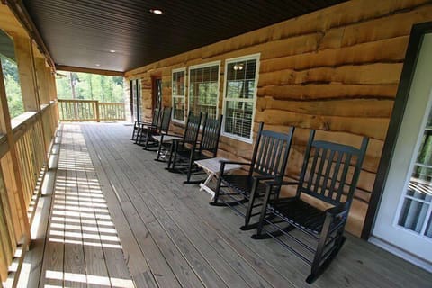 Indulge yourself with joyful bird songs & sound of the creek on a rocking chair.