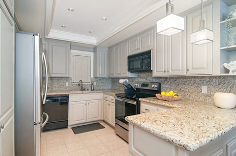 The kitchen is equipped for cooking and entertaining